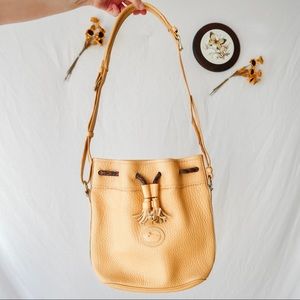 Vintage Dooney & Bourke Teton Drawstring Bucket Purse in Palomino yellow